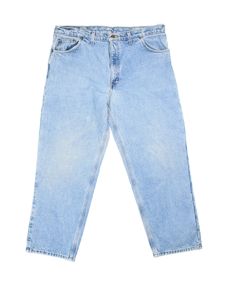 Carhartt Jeans in a blue colourway with brushed checked lining. Multiple pockets and the logo embroidered on the back.