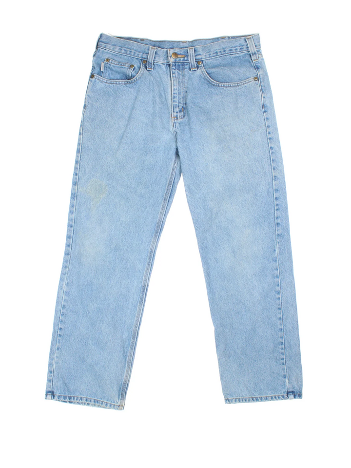 Carhartt Jeans in a blue colourway with multiple pockets and the logo embroidered on the back.