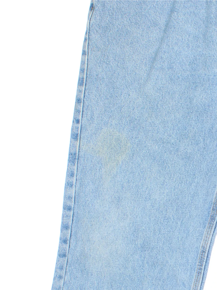 Carhartt Jeans in a blue colourway with multiple pockets and the logo embroidered on the back.