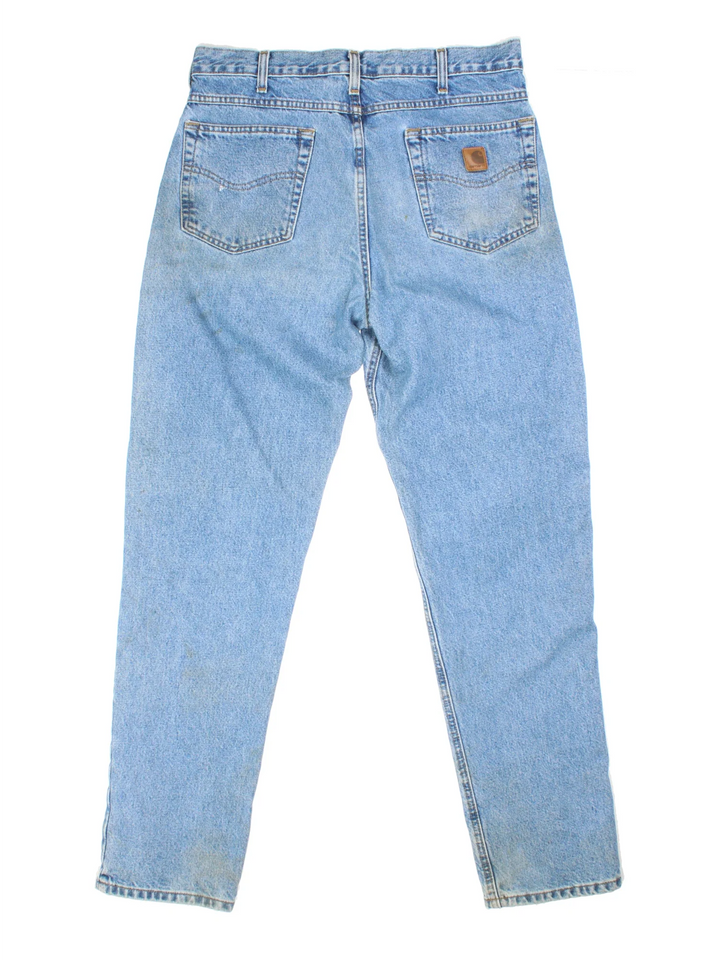 Carhartt Jeans in a blue colourway with multiple pockets and the logo embroidered on the back.