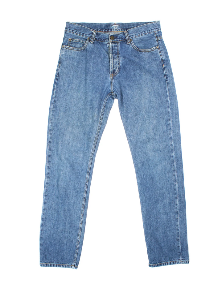 Carhartt Jeans in a blue colourway with multiple pockets and the logo embroidered on the back.