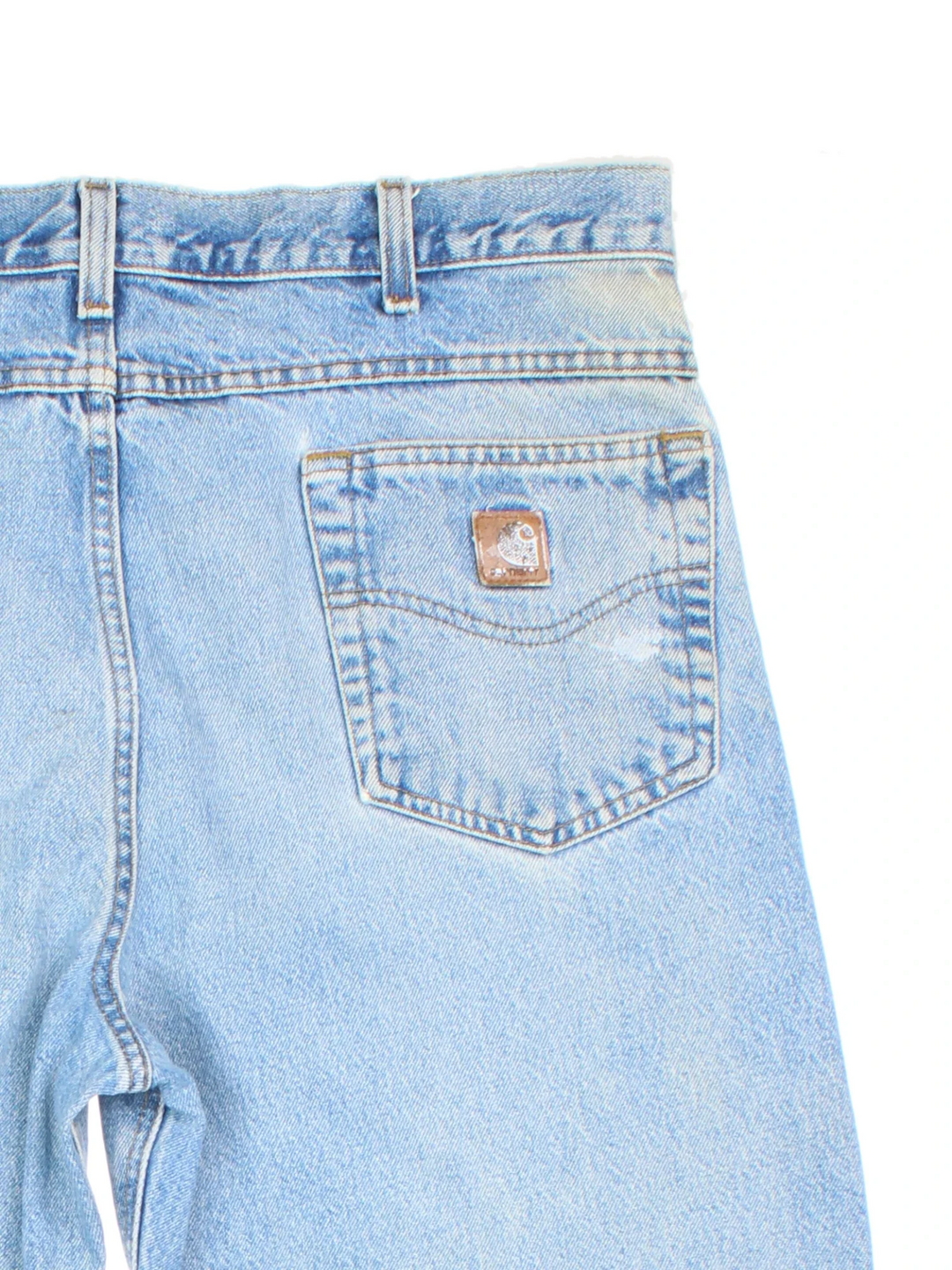 Carhartt Jeans in a blue colourway with multiple pockets and the logo embroidered on the back.
