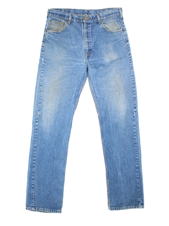 Carhartt Jeans in a blue colourway with multiple pockets and the logo embroidered on the back.