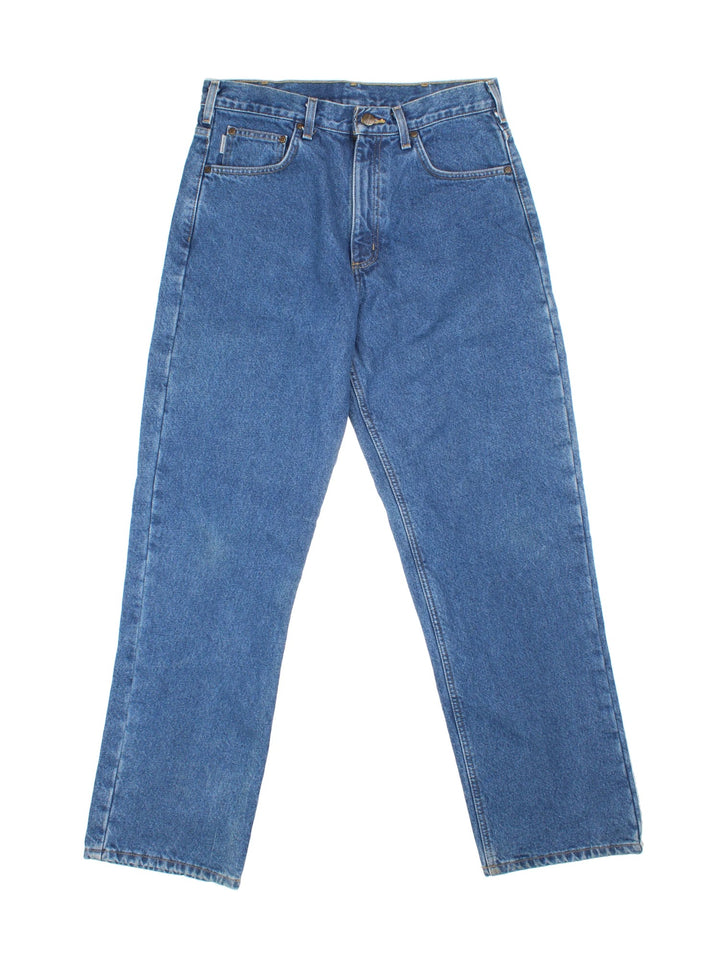 Carhartt Jeans in a blue colourway with brushed checked lining. Multiple pockets and the logo embroidered on the back.
