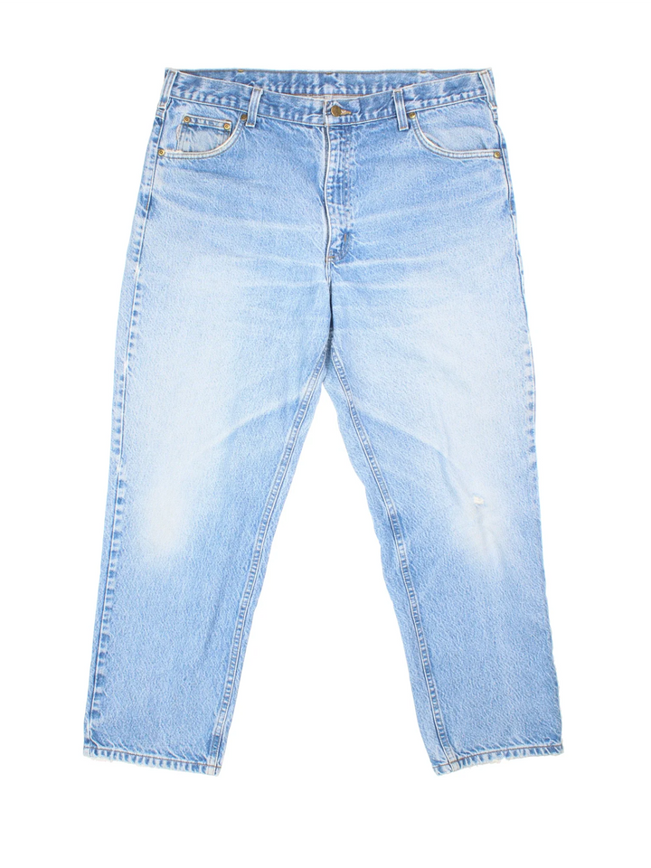 Carhartt Jeans in a blue colourway with multiple pockets and the logo embroidered on the back.