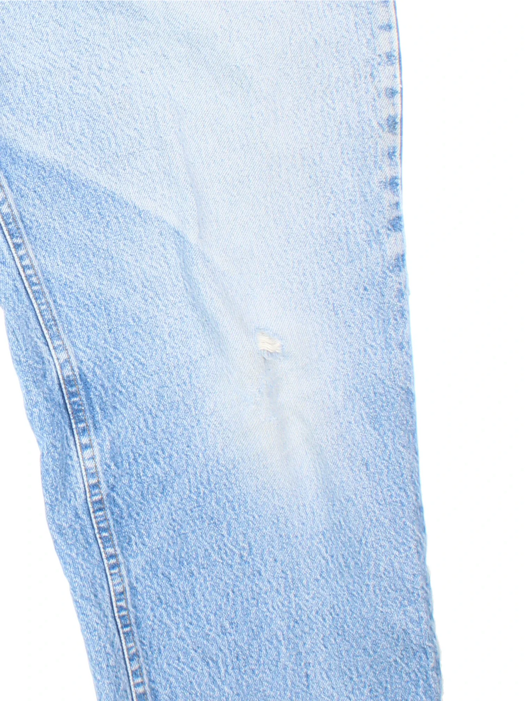 Carhartt Jeans in a blue colourway with multiple pockets and the logo embroidered on the back.