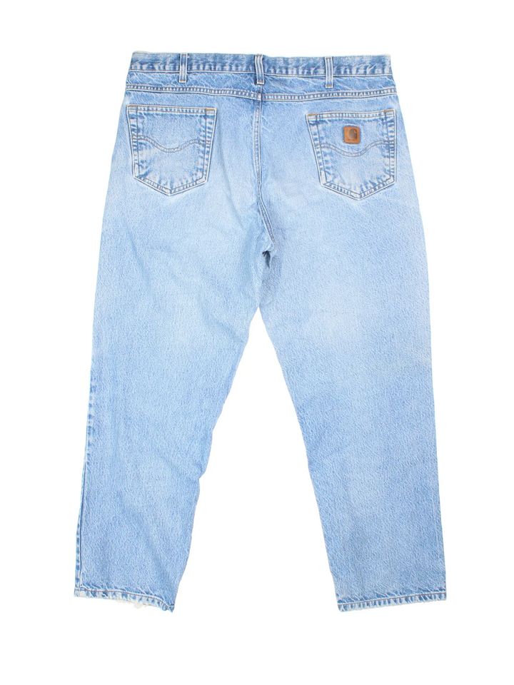 Carhartt Jeans in a blue colourway with multiple pockets and the logo embroidered on the back.