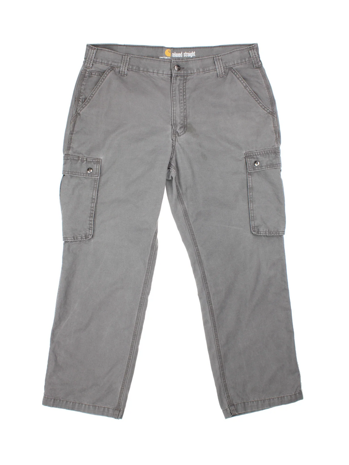 Carhartt Trousers in a grey colourway with multiple pockets and the logo embroidered on the back.
