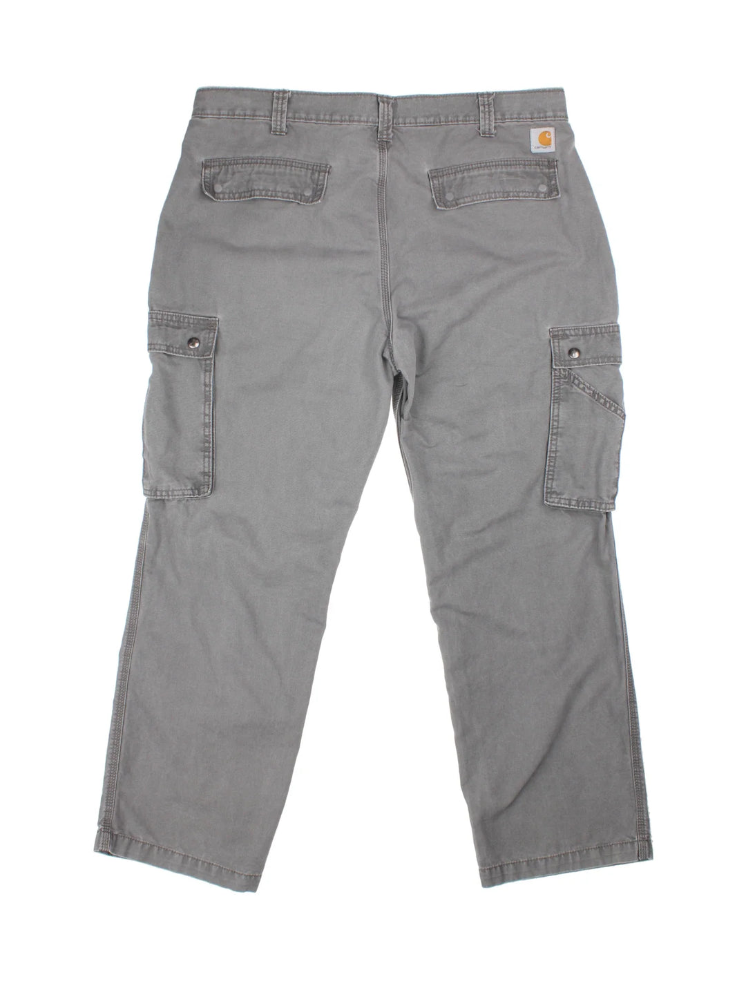 Carhartt Trousers in a grey colourway with multiple pockets and the logo embroidered on the back.