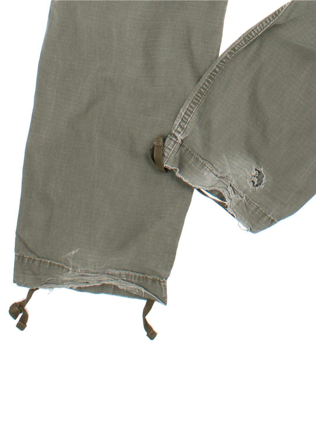 Carhartt Cargo Trousers in a green colourway with multiple pockets and the logo embroidered on the back.