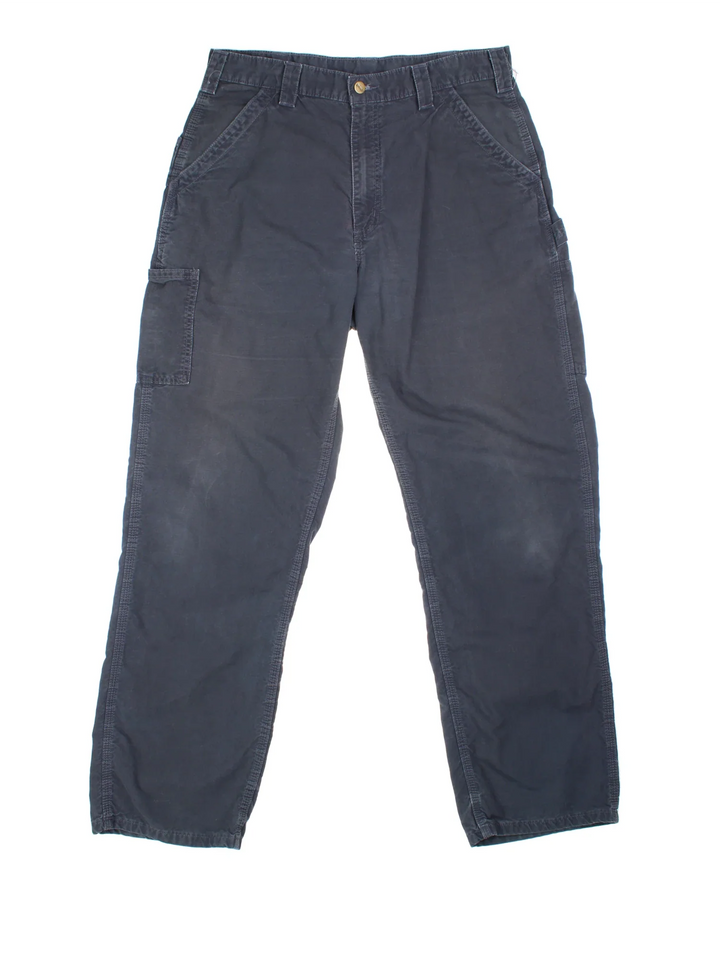 Carhartt Cargo Trousers in a blue colourway with multiple pockets and the logo embroidered on the back.