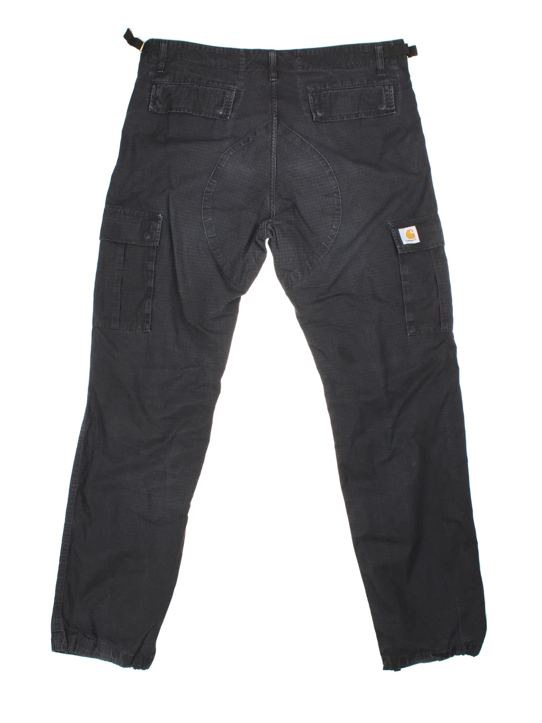 Carhartt Cargo Trousers in a black colourway with multiple pockets and the logo embroidered on the back.