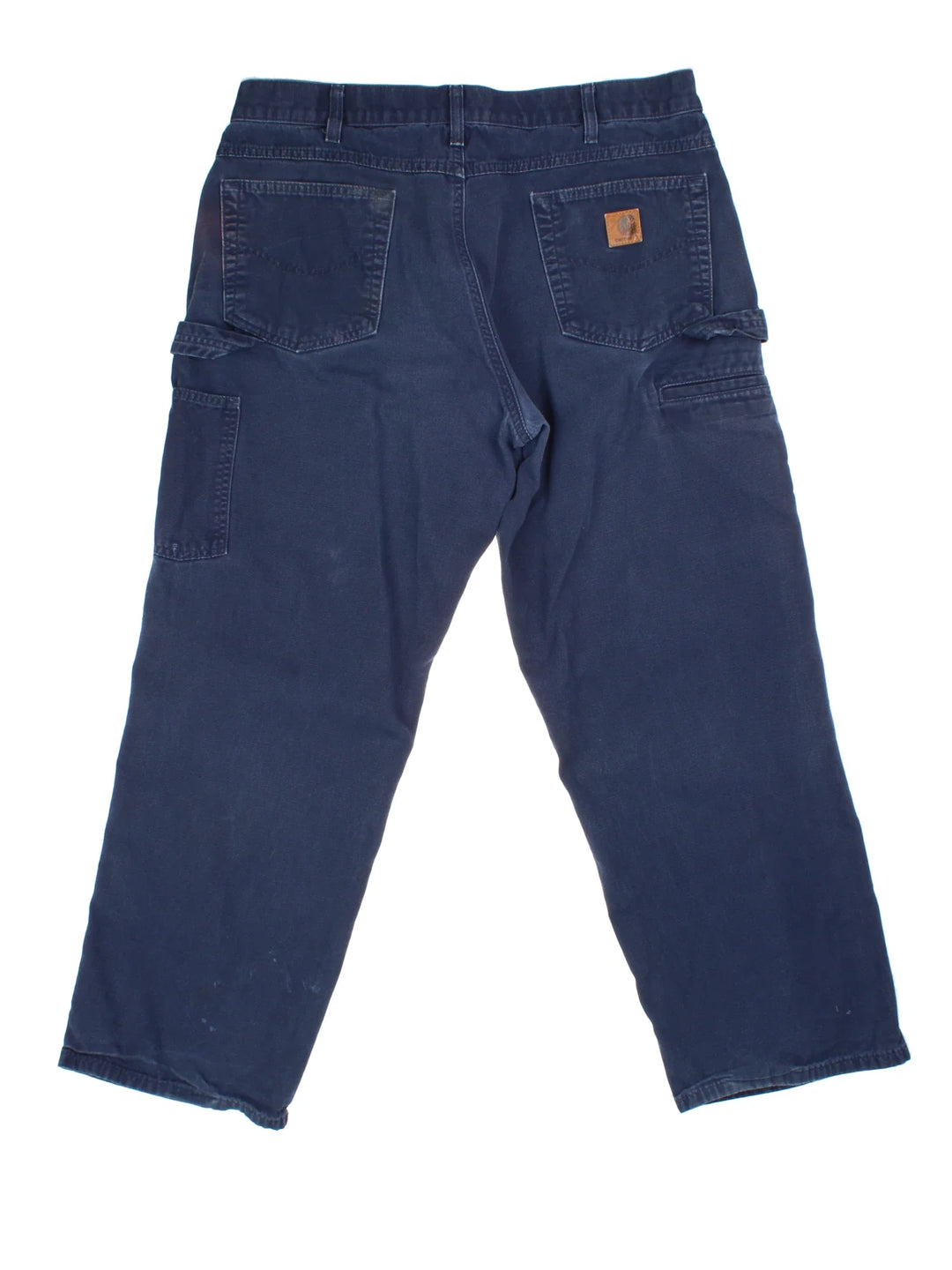Carhartt Carpenter Jeans in a blue colourway with multiple pockets and the logo embroidered on the back.