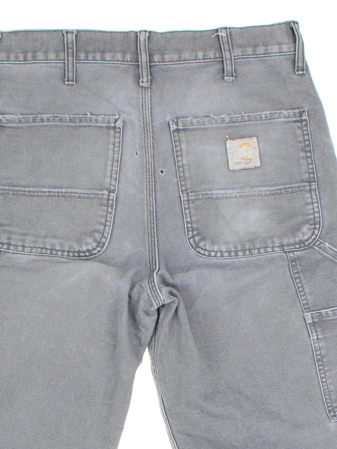 Carhartt Carpenter Jeans in a grey colourway with multiple pockets and the logo embroidered on the back.