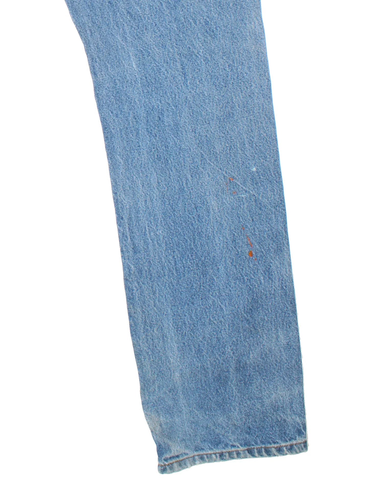 Carhartt Jeans in a blue colourway with multiple pockets and the logo embroidered on the back.