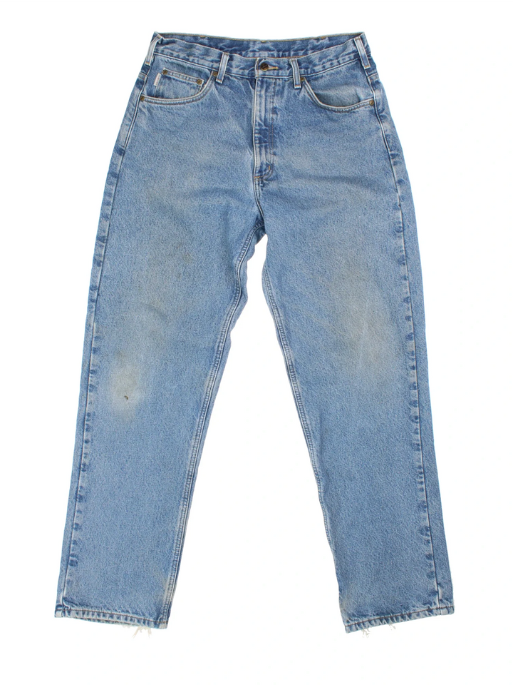 Carhartt Jeans in a blue colourway with multiple pockets, checked lining and the logo embroidered on the back.