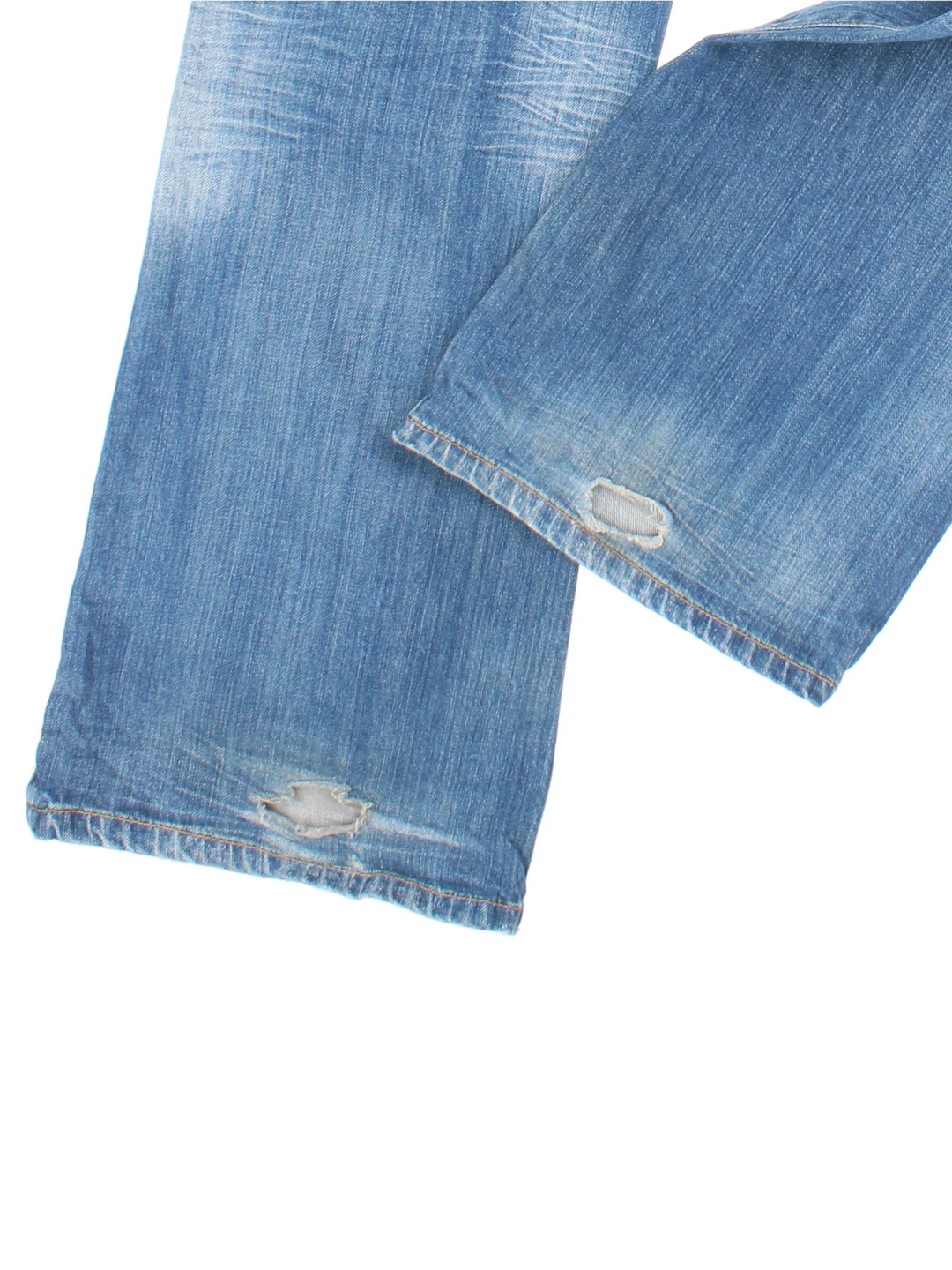 Carhartt Jeans in a blue colourway with multiple pockets and the logo embroidered on the back.