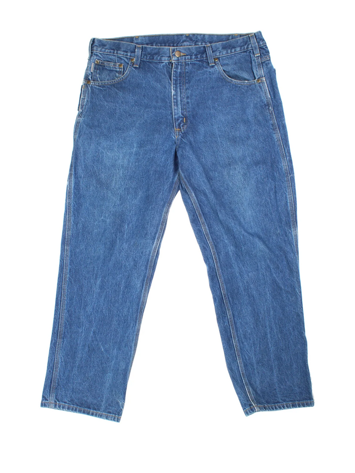 Carhartt Jeans in a blue colourway with multiple pockets and the logo embroidered on the back.