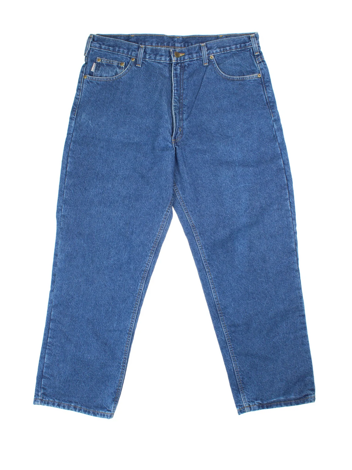 Carhartt Jeans in a blue colourway with multiple pockets, checked lining and the logo embroidered on the back.