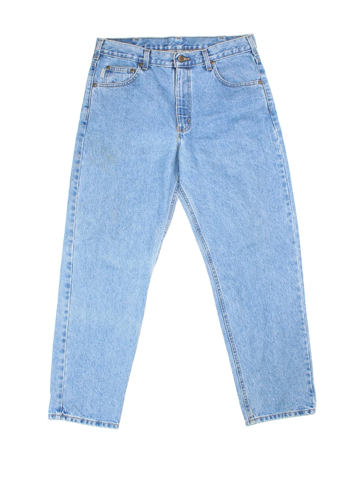 Carhartt Jeans in a blue colourway with multiple pockets and the logo embroidered on the back.