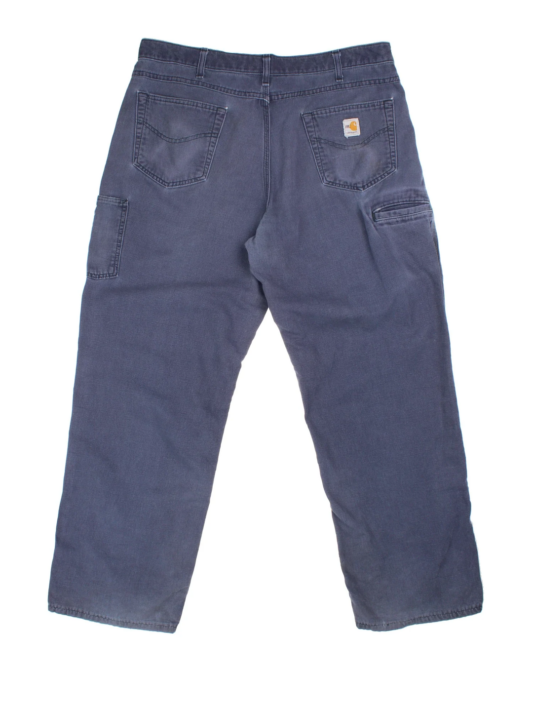 Carhartt Carpenter Trousers in a blue colourway with multiple pockets and the logo embroidered on the back.