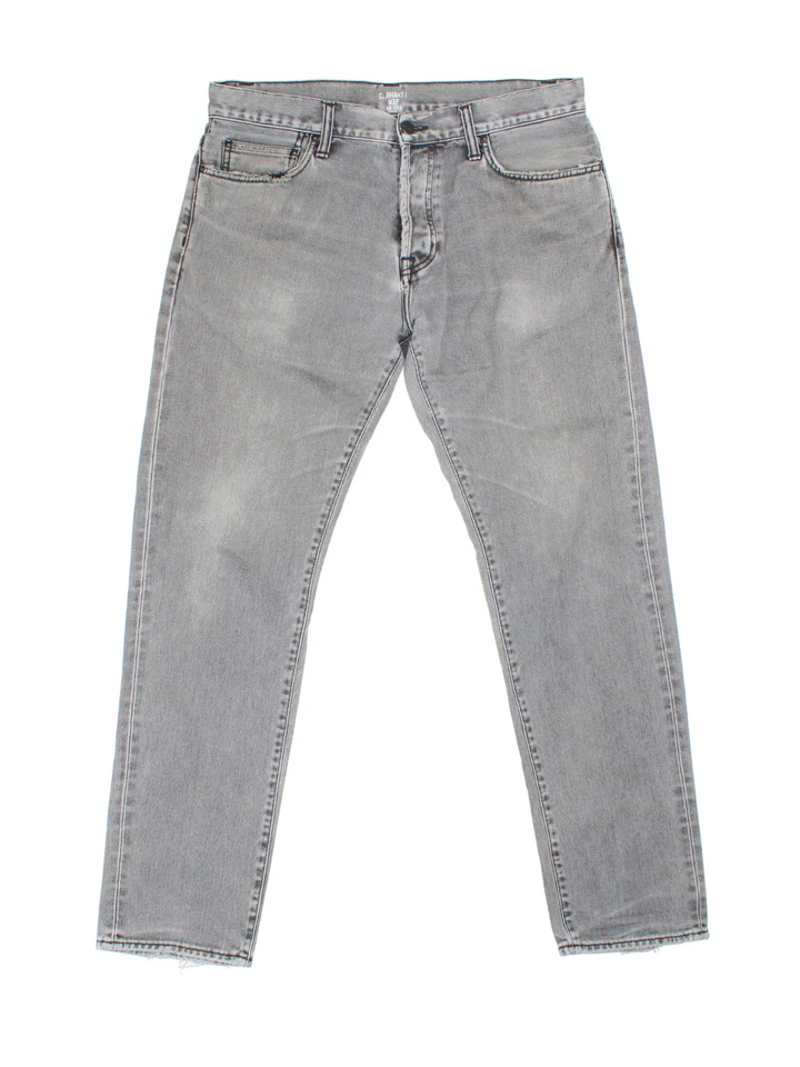 Carhartt Jeans in a grey colourway with multiple pockets and the logo embroidered on the back.