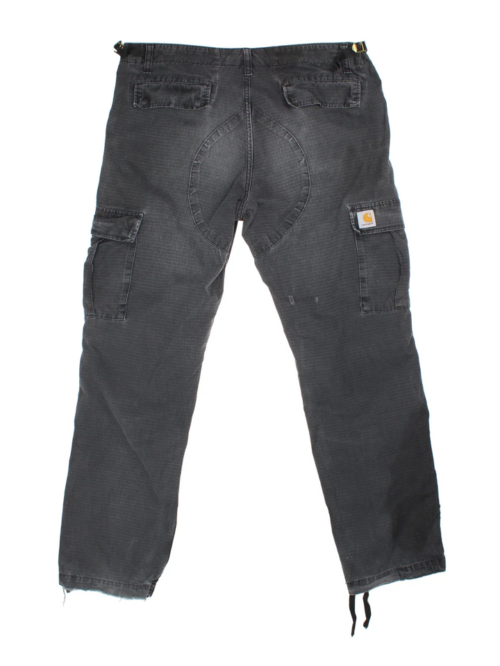 Carhartt Cargo Trousers in a black colourway with multiple pockets and the logo embroidered on the back.