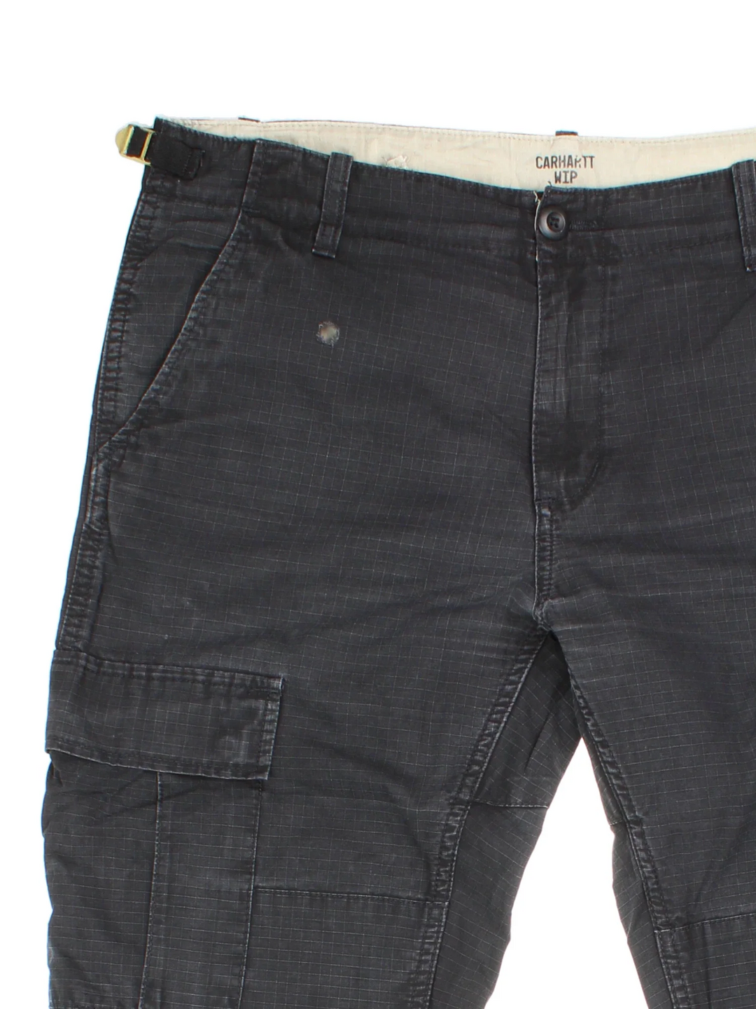Carhartt Cargo Trousers in a black colourway with multiple pockets and the logo embroidered on the back.