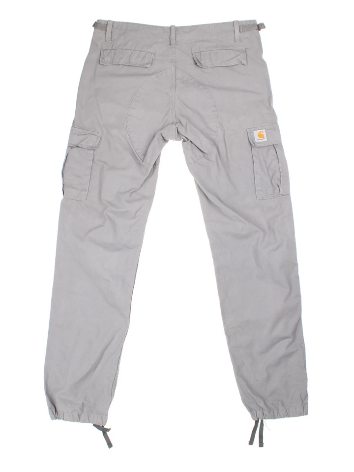 Carhartt Cargo Trousers in a grey colourway with multiple pockets and the logo embroidered on the back.