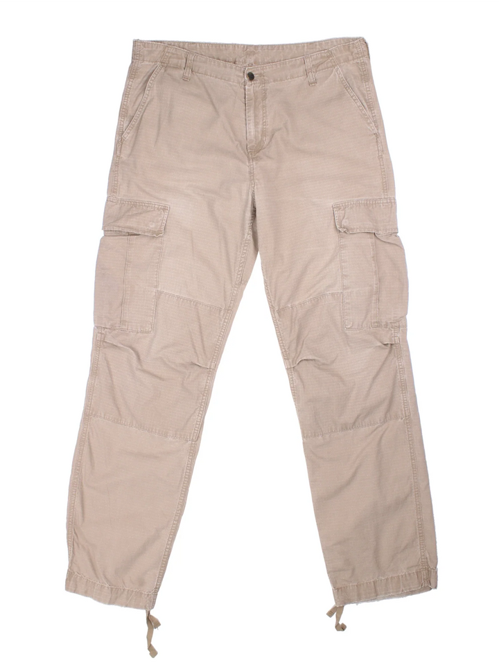Carhartt Cargo Trousers in a tan colourway with multiple pockets and the logo embroidered on the back.