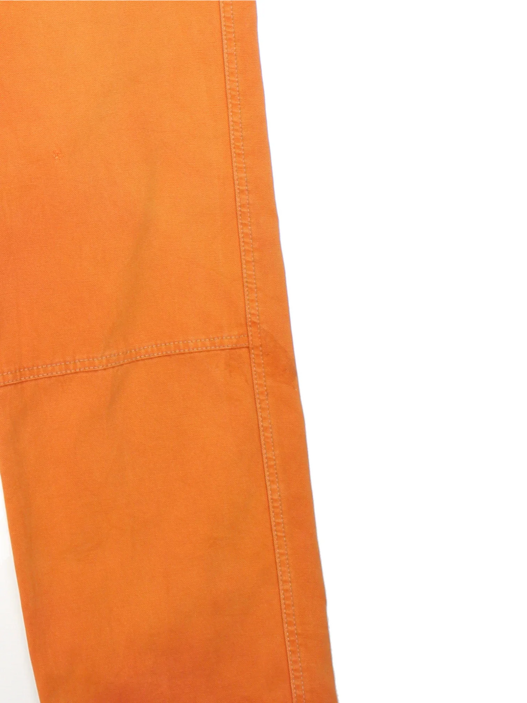 Vintage Double Knee Workwear Trousers in a sun burnt orange colourway with multiple pockets and has a Carhartt logo embroidered on the back - however please note these are not Carhartt but has been stitched on.
