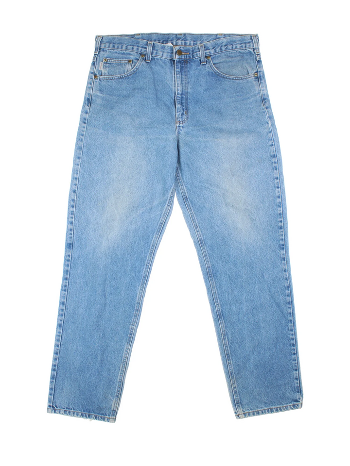 Carhartt Jeans in a blue colourway with multiple pockets and the logo embroidered on the back.