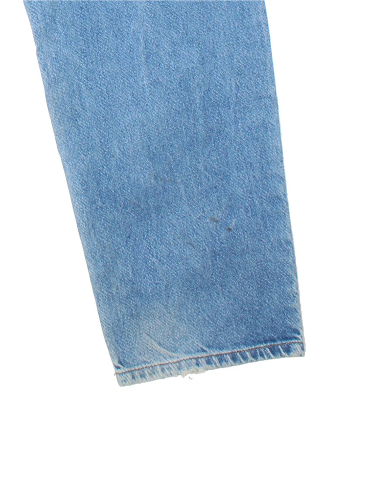 Carhartt Jeans in a blue colourway with multiple pockets and the logo embroidered on the back.