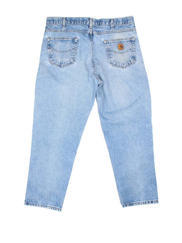 Carhartt Jeans in a blue colourway with multiple pockets and the logo embroidered on the back.