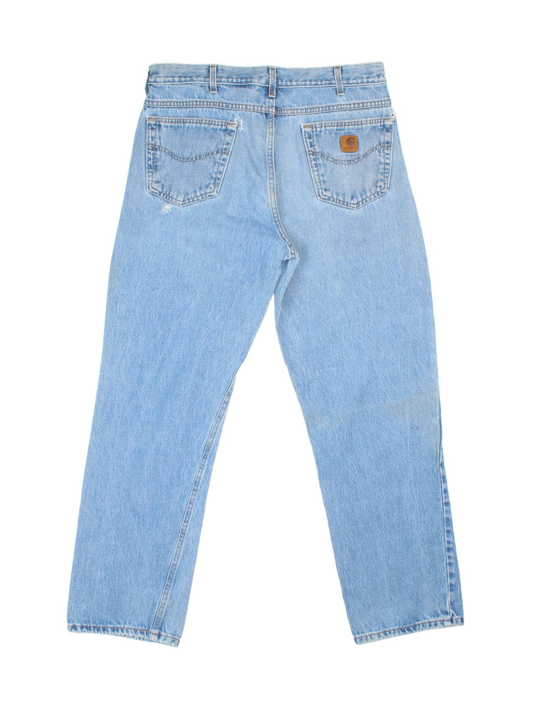 Carhartt Jeans in a blue colourway with multiple pockets and the logo embroidered on the back.