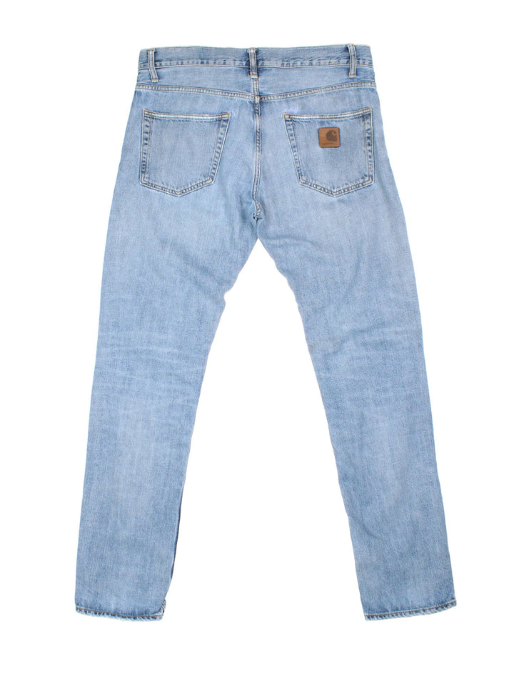 Carhartt Klondike Pant Jeans in a blue colourway with multiple pockets and the logo embroidered on the back.