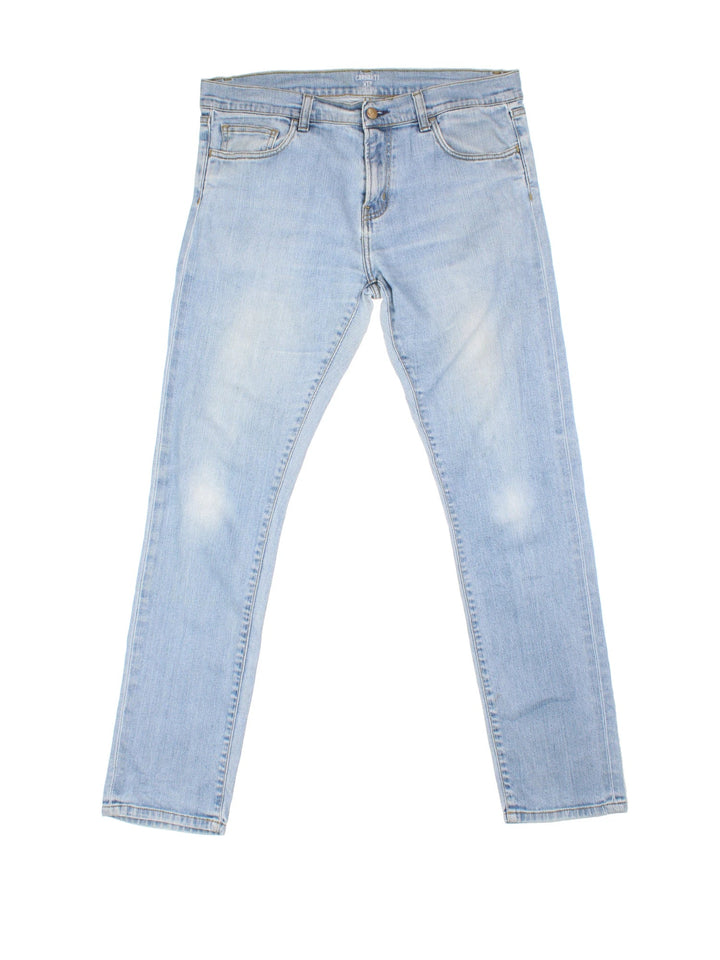 Carhartt Rebellion Pant Jeans in a blue colourway with multiple pockets and the logo embroidered on the back.