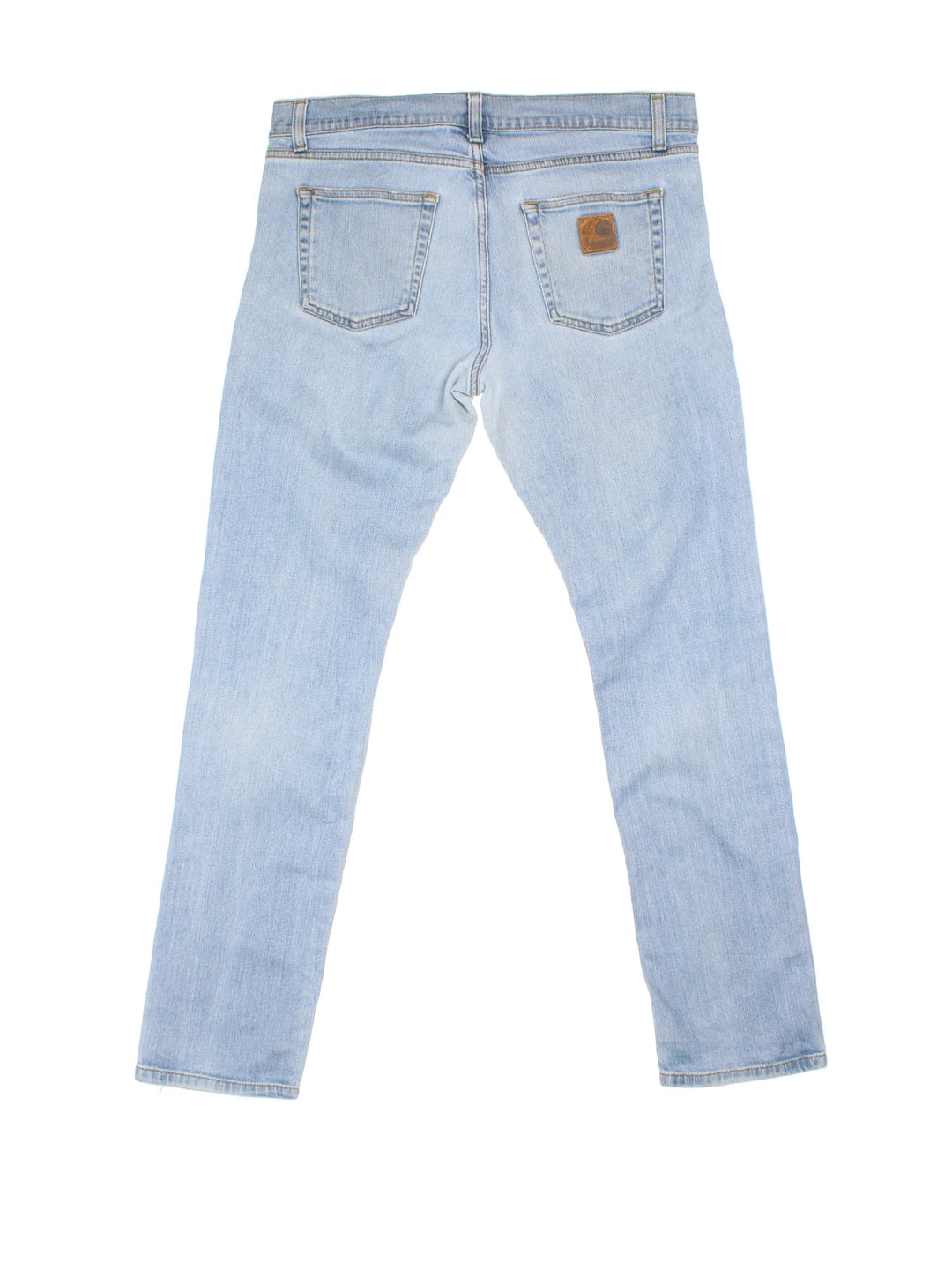 Carhartt Rebellion Pant Jeans in a blue colourway with multiple pockets and the logo embroidered on the back.