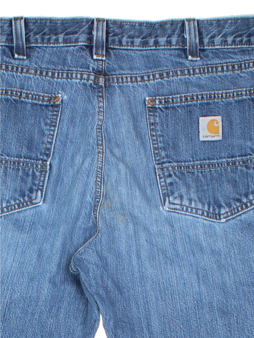 Carhartt Jeans in a blue colourway with multiple pockets and the logo embroidered on the back.