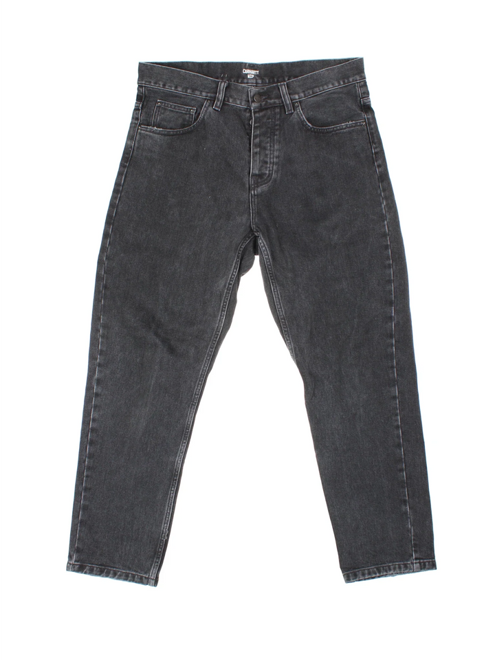 Carhartt Newel Pant Jeans in a black colourway with multiple pockets and the logo embroidered on the back.