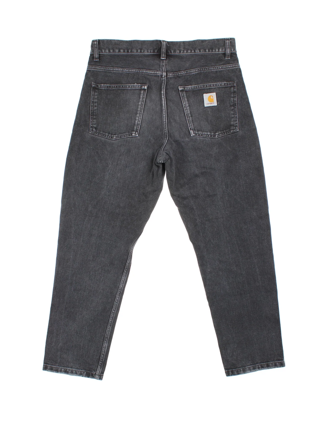 Carhartt Newel Pant Jeans in a black colourway with multiple pockets and the logo embroidered on the back.