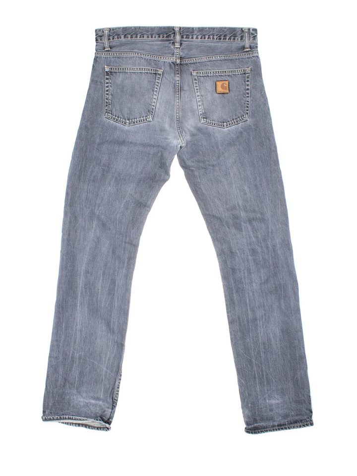 Carhartt Davies Pant Jeans in a grey colourway with multiple pockets and the logo embroidered on the back.
