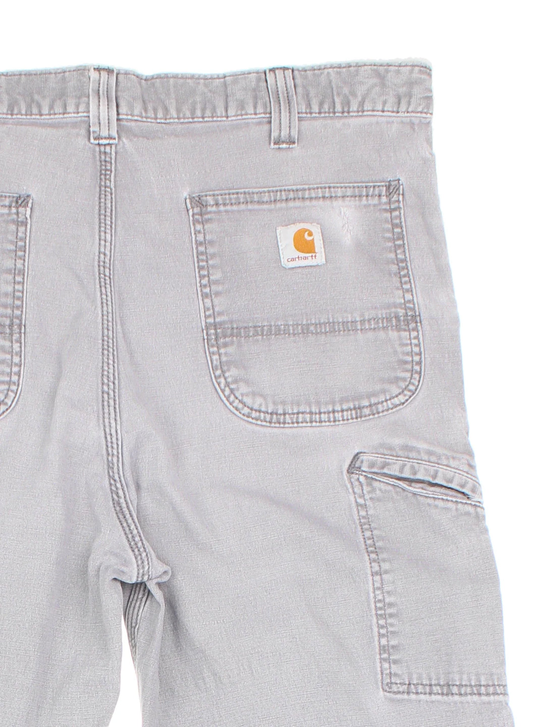 Carhartt Carpenter Jeans in a grey colourway with multiple pockets and the logo embroidered on the back.