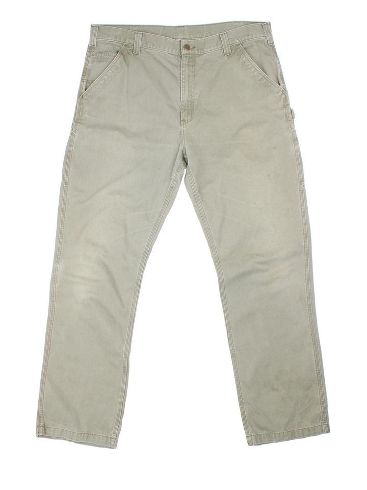 Carhartt Trousers in a green colourway with multiple pockets and the logo embroidered on the back.
