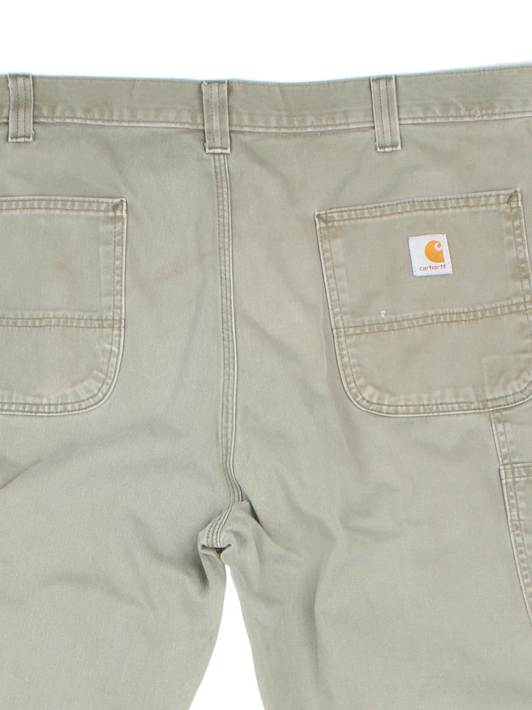 Carhartt Trousers in a green colourway with multiple pockets and the logo embroidered on the back.