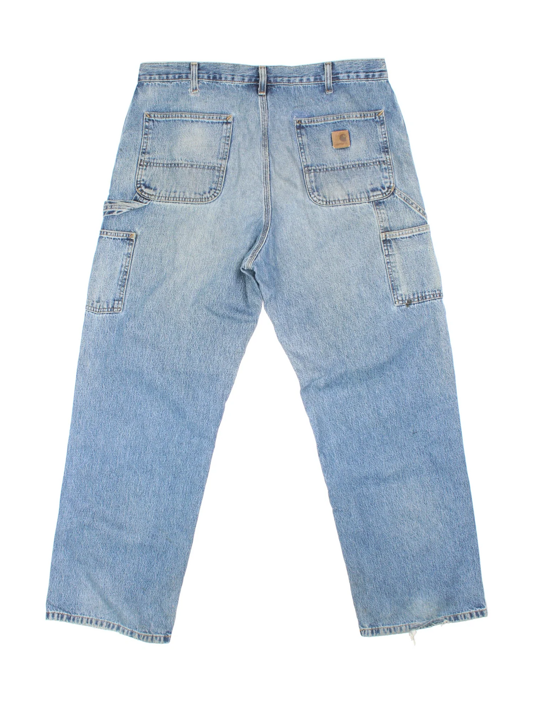 Carhartt Carpenter Jeans in a blue colourway with multiple pockets and the logo embroidered on the back.