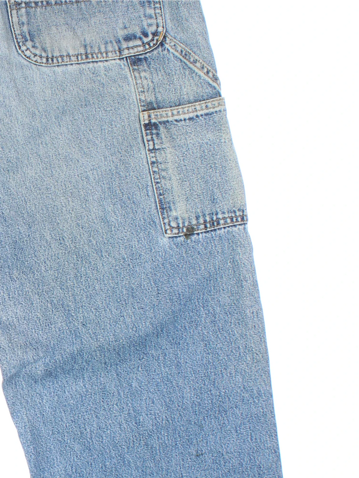 Carhartt Carpenter Jeans in a blue colourway with multiple pockets and the logo embroidered on the back.