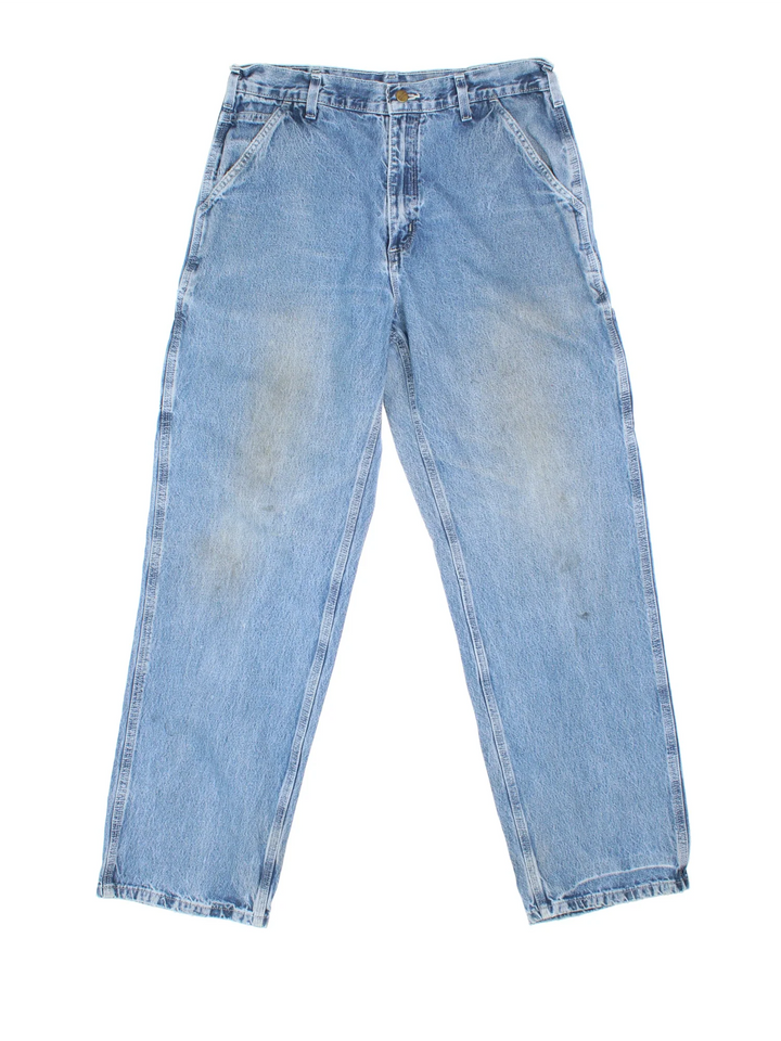 Carhartt Jeans in a blue colourway with multiple pockets and the logo embroidered on the back.
