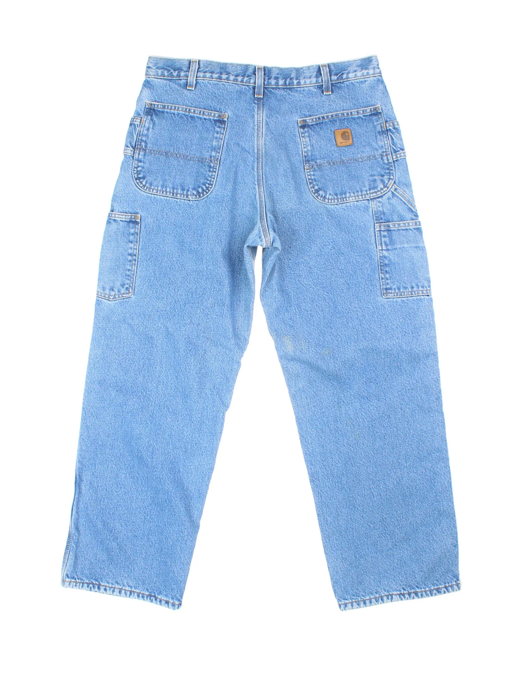 Carhartt Thermal Lined Carpenter Jeans in a blue colourway with multiple pockets and the logo embroidered on the back.
