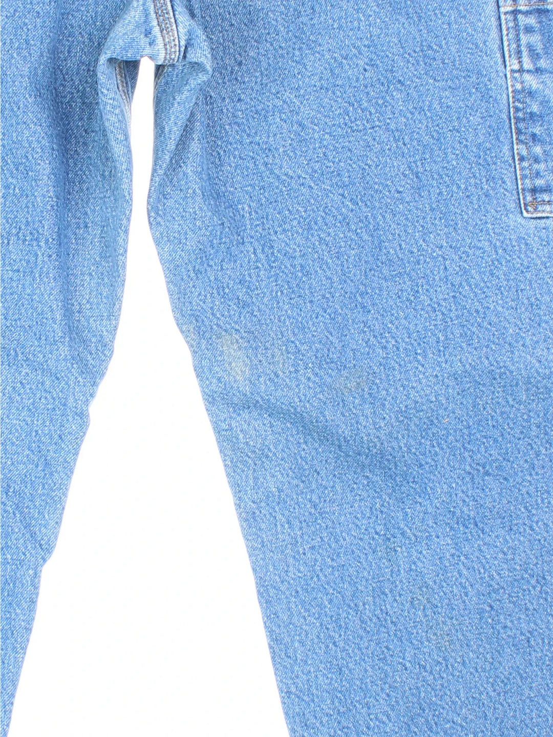 Carhartt Thermal Lined Carpenter Jeans in a blue colourway with multiple pockets and the logo embroidered on the back.
